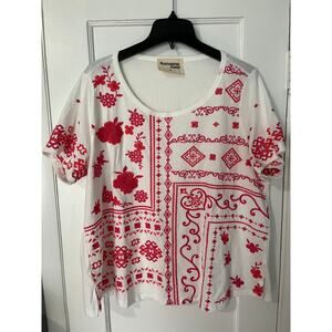 T-Shirt style with front pink/coral embroidery.  Savanna Janes.  1X Plus Size.